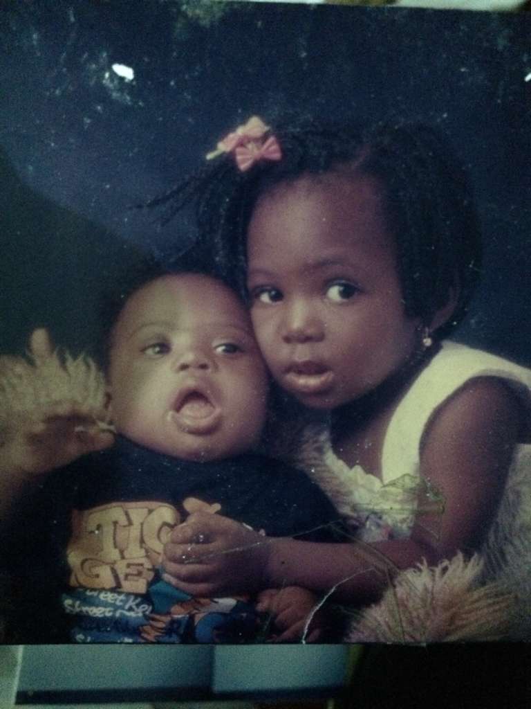 Abimbola and her brother, Folarin — photograph 2 of 11